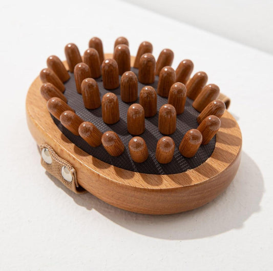 Wooden scalp brush with massage bead